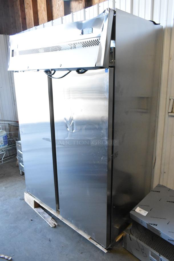 Brand new Avantco 178Z2FHC stainless steel commercial 2-door reach-in freezer with poly coated racks, scratch and dent.