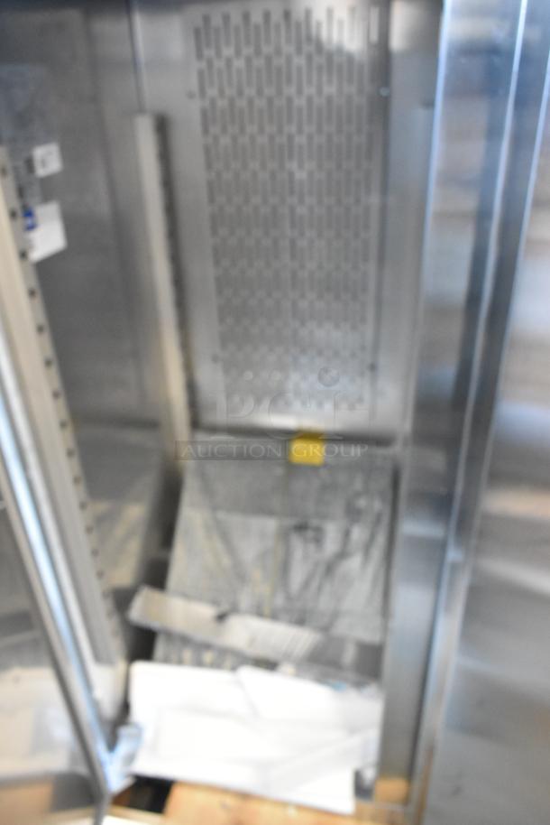 Brand new Avantco 178Z2FHC stainless steel 2-door reach-in freezer with poly-coated racks, 115V, 1-phase. Scratch and dent condition.