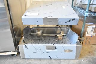Brand new Hatco GRFHS-PT26 stainless steel fry holding station, 29" pass-through, 6" base, 120V 1-phase, packaging shows light wear.