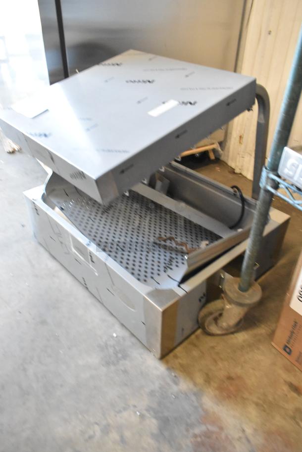 Brand new Hatco GRFHS-PT26 stainless steel fry holding station, 29" pass-through, 6" base, scratch and dent condition.