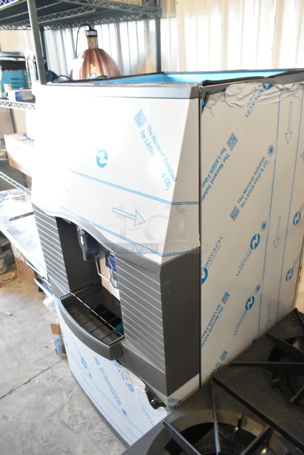 Brand new 2025 Manitowoc SPA312-161 stainless steel touchless ice dispenser, 180 lb capacity, 30" wide. Scratch and dent condition.