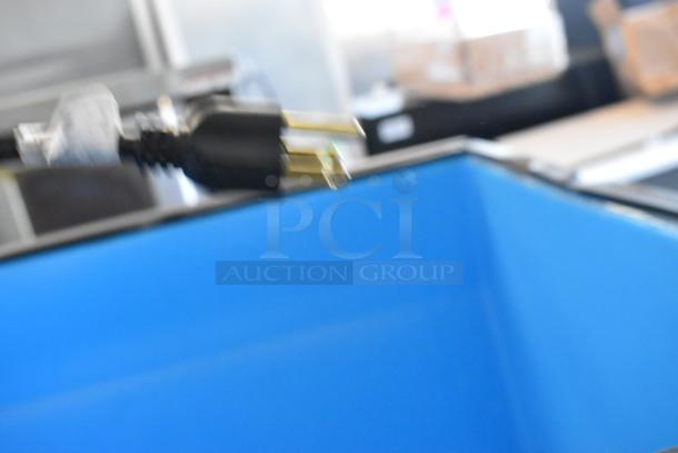 2025 Manitowoc stainless steel ice dispenser, 30", touchless, 180 lb. capacity, 115V, model SPA312-161, scratch and dent condition.