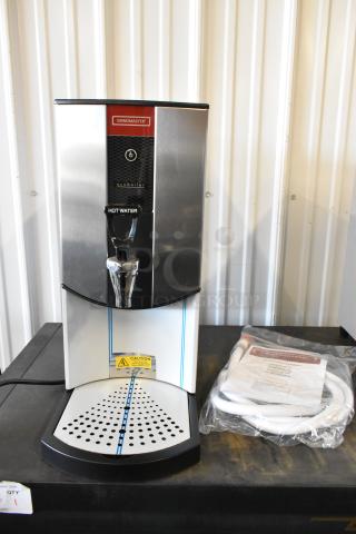 Brand new Grindmaster 1000660GM 5.3-gallon hot water dispenser, tap-operated, 240 volts, 1 phase, in excellent condition.