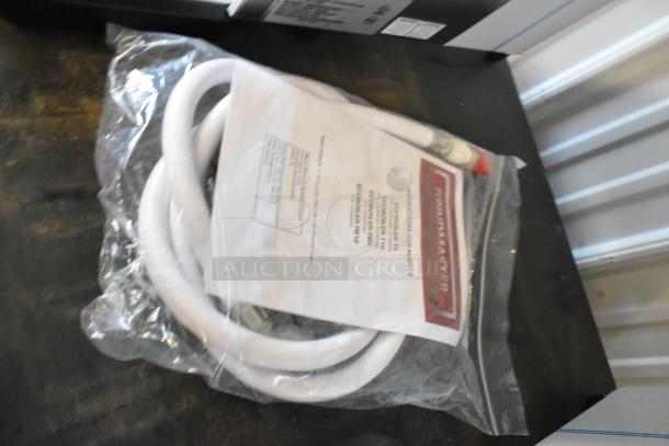 Bagged manual and hose for Grindmaster 1000660GM hot water dispenser. Clear packaging, new condition.