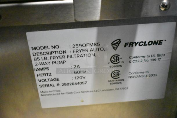 "Fryclone 259OFM85 fryer oil filter machine tag showing model, 85 lb. capacity, 2-way pump, 120V, new condition."