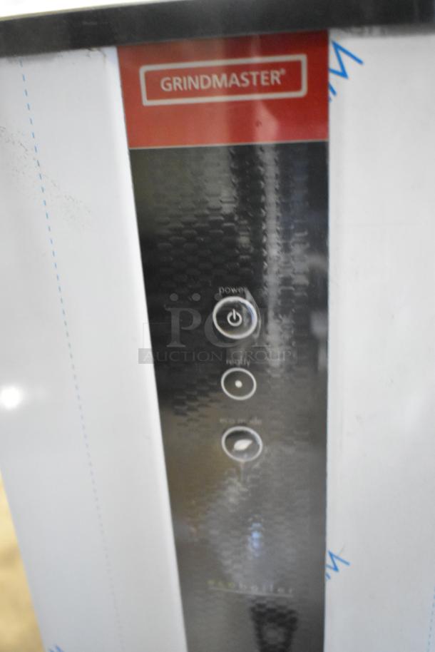 BRAND NEW Grindmaster Ecoboiler T20 hot water dispenser, model 1000662GM, 220V, tap-operated, minor scratches.