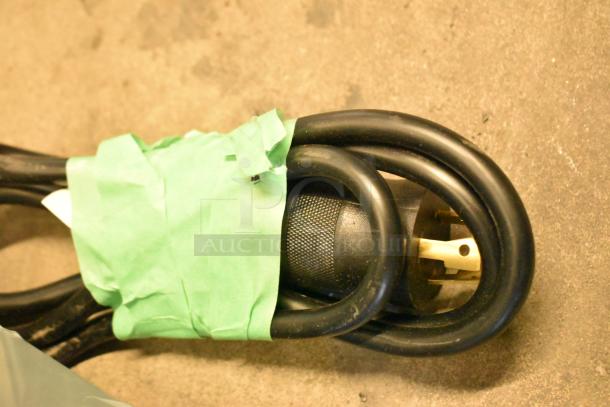 Coiled black power cord with a taped bundle, part of the Grindmaster 1000662GM Ecoboiler T20 hot water dispenser.