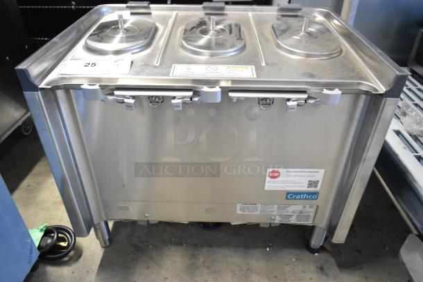 Brand new Crathco CS-3L-16-290 stainless steel drink dispenser base, no hoppers, 120 volts, 1 phase, with labels.