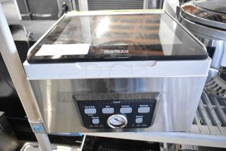 Brand new Galaxy 177GVMC12P vacuum packaging machine with 12" seal bar, stainless steel, dry pump, 120V, 1 phase.