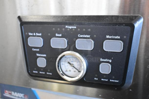 Stainless steel control panel of 2024 Galaxy 177GVMC12P vacuum packaging machine, showing various function buttons and pressure gauge.