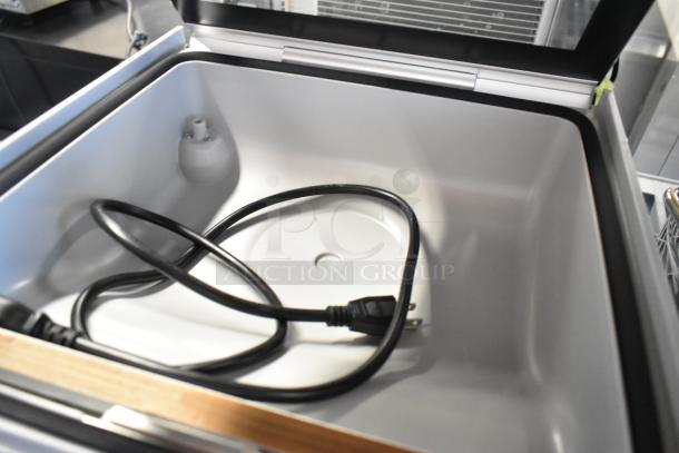 BRAND NEW Galaxy 177GVMC12P chamber vacuum in stainless steel, open lid view. Includes 12" seal bar and power cord.