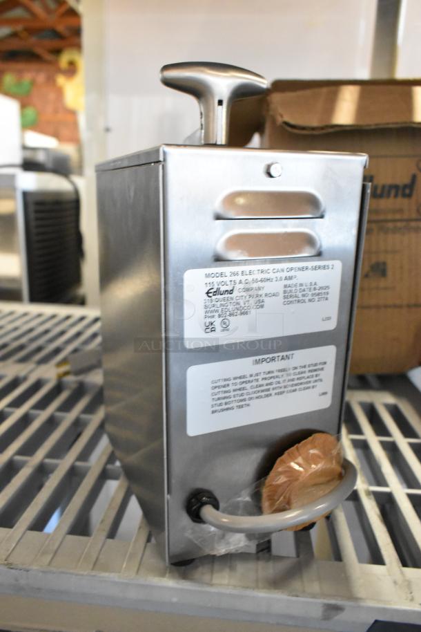 Brand new Edlund 266 stainless steel electric can opener, single-speed, 115 volts, scratch and dent condition, with label.