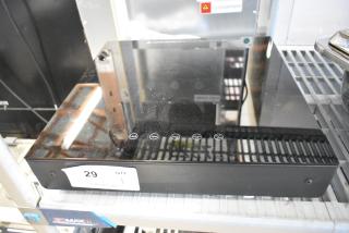 Brand new Avantco 177ICW300 16" x 16" black countertop induction warmer. Scratch and dent, 120V, with control panel.