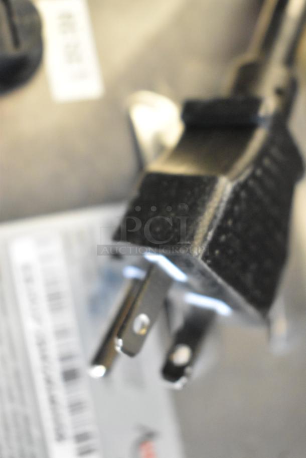 Close-up of Avantco 177EB202F2BM hot plate heavy-duty plug. Image includes partial view of manufacturer's label.