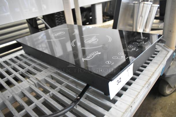 Brand new Avantco 177ID18DB double induction range, scratch and dent, 2024 model, 208-240V, black glass top, visible touch controls.