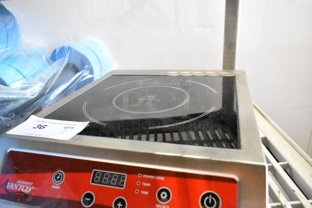 Brand new Avantco 177IC3500 countertop induction cooker, 208-240V, 1 phase, with digital display, slight scratches visible.