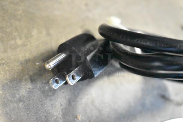 Power cord of the AvaMix DM-B-21C milkshake machine, 110-120V, showing a standard plug suitable for the outlet.