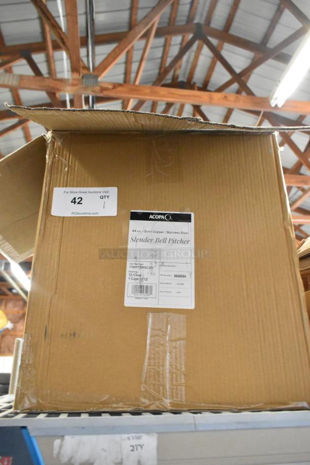 Box of Acopa 176PITCHSC2Q 64 oz. Satin Copper Stainless Steel Slender Bell Pitcher, new, with label and auction tag visible.