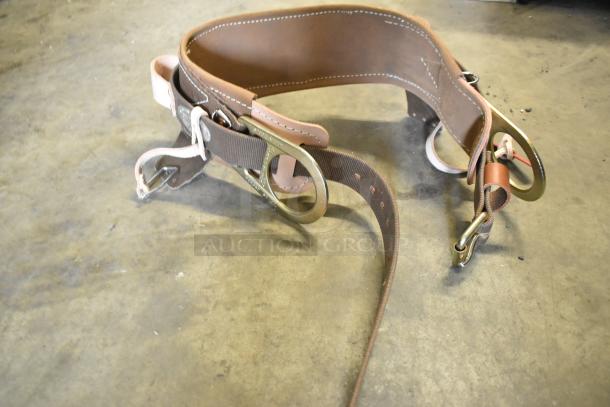 Brand new Klein Tools 5268N23D body belt, scratch and dent condition, durable leather with metal buckles and loops.