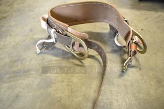 Brand new Klein Tools 5268N23D body belt, scratch and dent condition, durable leather with metal buckles and loops.