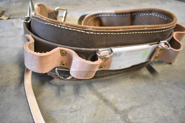 Klein Tools 5268N23D Body Belt, new, scratch and dent. Brown with leather accents, reinforced stitching, durable hardware.