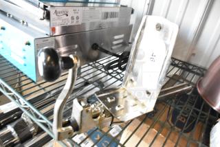 Brand new Choice light duty manual can opener with base plate, silver, ideal for standard duty use. Slight scratches visible.