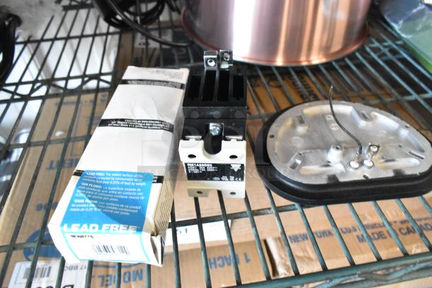Watts 3/4 LF10L-2 valve, RM1A23D50 component, heating element. New, scratch and dent. Lead-free label visible.