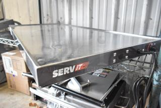Brand new 2024 ServIt 423HSW2042 42" stainless steel heated shelf warmer, 120V, 1 phase, with minor scratches and dents.