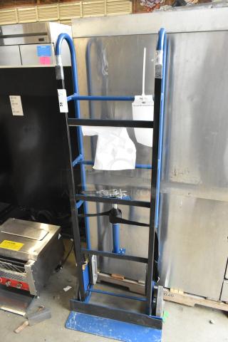 Brand new Lavex 257AP0032 550 lb. blue steel appliance hand truck with 8" wheels, minor scratches.
