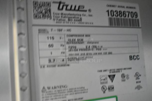 2022 True T-19F-HC stainless steel commercial freezer label, showing 115V, 1 Phase details, serial number 10386709.