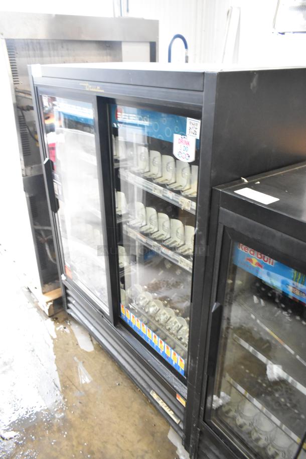 True GDM-41SL-60-LD commercial 2-door reach-in cooler merchandiser with poly-coated racks, 115V, 1 phase.