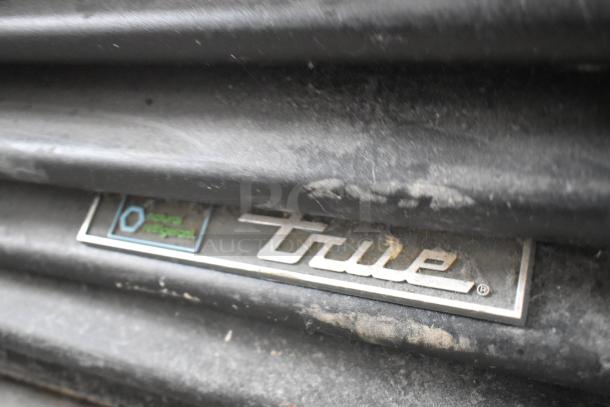 2019 True GDM-41SL-48-HC-LD cooler logo and grille detail, showing brand marking and design.