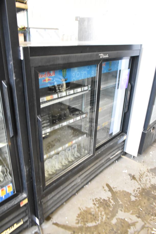 2019 True GDM-41SL-48-HC-LD 2-door reach-in cooler, metal frame, poly coated racks, 115V, used condition.