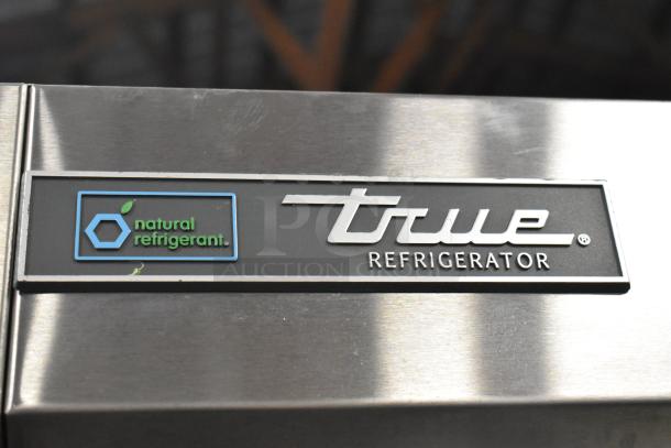 2018 True T-35-HC stainless steel 2-door commercial cooler; "natural refrigerant" label, 115V, 1 phase.