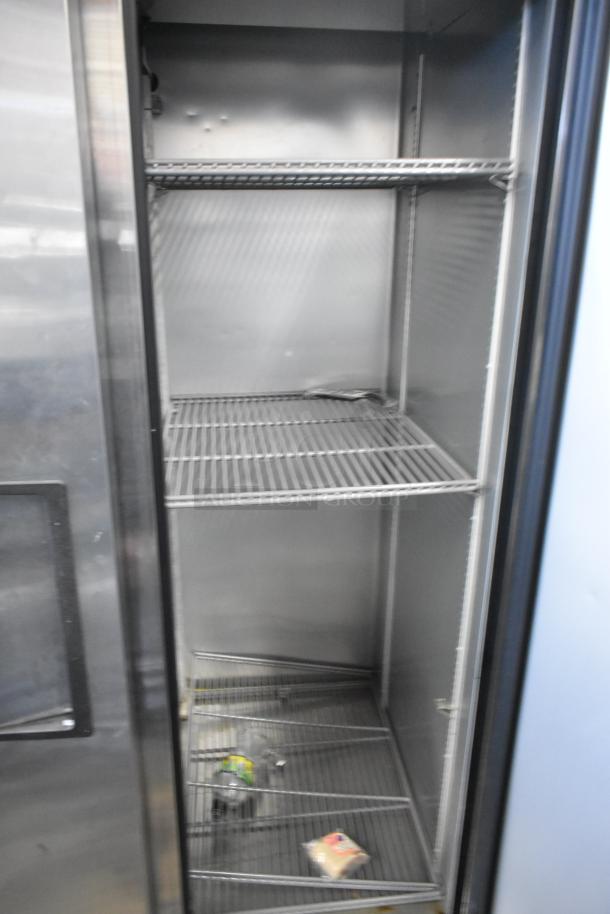 2018 True T-35-HC stainless steel 2-door commercial cooler, poly-coated racks, 115V, excellent condition.
