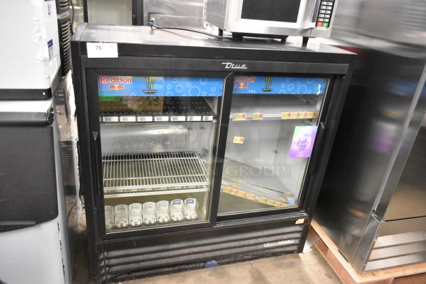2019 True GDM-41SL-48-HC-LD commercial cooler, 2 glass doors, poly-coated racks, 115V, 1 phase, good condition.