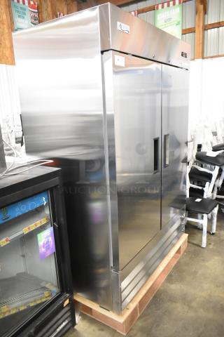 Brand new Avantco 178A49RHC stainless steel 2-door reach-in cooler, 115V, with poly-coated racks, minor scratches.