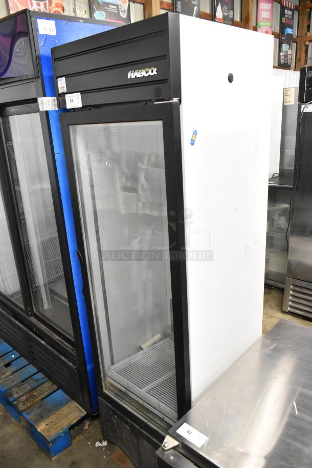 2019 Habco SE18 metal single door reach-in cooler, glass front, poly-coated racks, used condition, 115 volts, 1 phase.