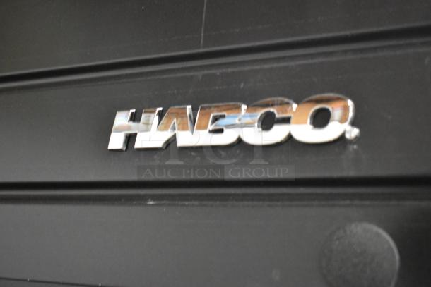2019 Habco SE18 cooler with a metal exterior and poly coated racks. Single door, 115V, 1 phase. Habco logo visible.