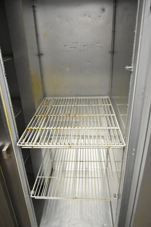 Beverage Air EF48-1AS stainless steel 2-door commercial freezer, visible interior with poly coated racks. 115V, 1 Phase.