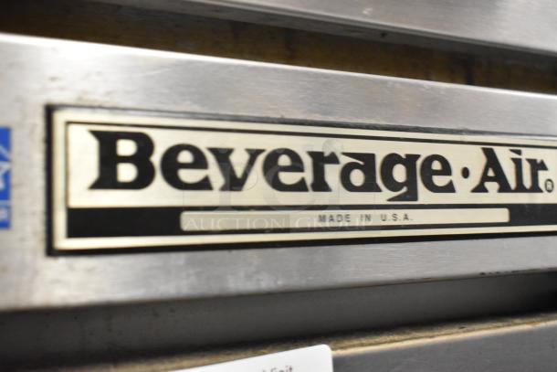 Beverage Air EF48-1AS stainless steel freezer with two doors, poly-coated racks, and "Made in USA" label detail.