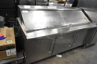 2019 Berg EDMT 72 30 stainless steel sandwich salad prep table, mega top, on commercial casters, in good condition.