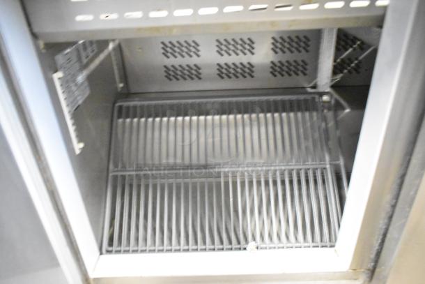 2019 Berg EDMT 72 30 BERG stainless steel prep table interior with shelving, commercial grade, electric 115V, on casters.