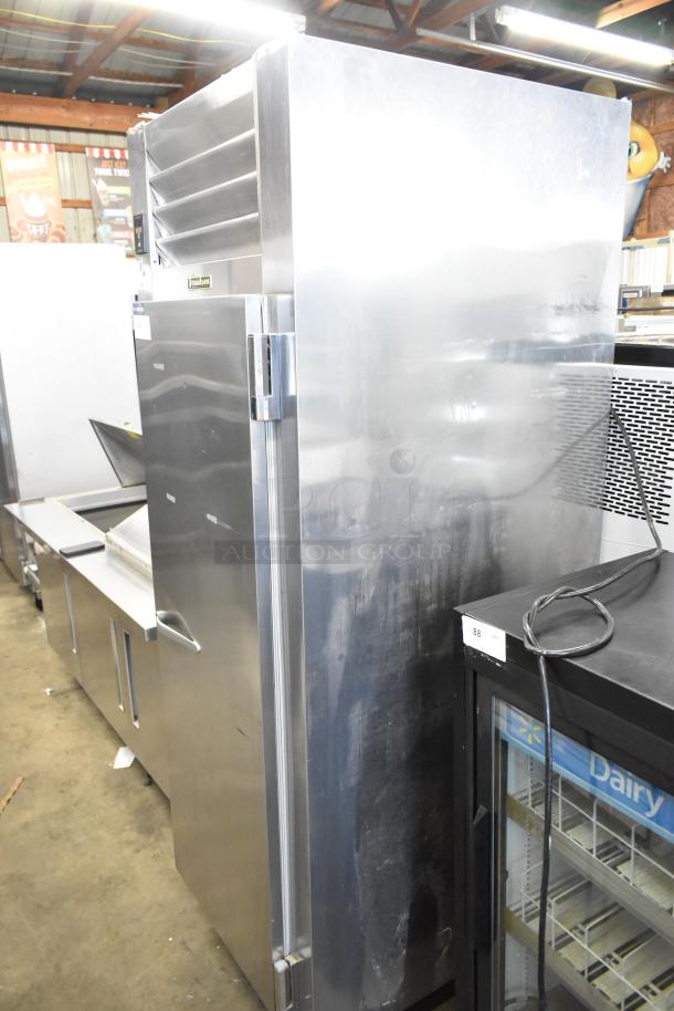 Traulsen AHT132WUT-FHS stainless steel commercial single door reach-in cooler with racks, 115V, 1 phase, in used condition.