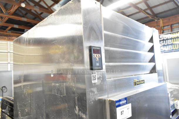 Traulsen AHT132WUT-FHS stainless steel commercial cooler with single door and racks, 115V, 1 phase, visible control panel.