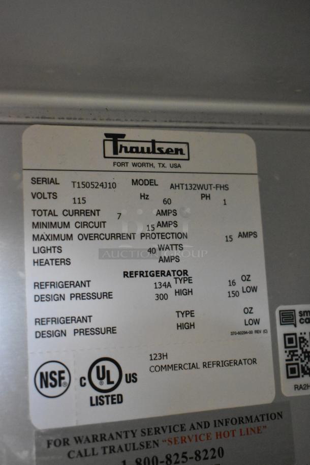 Traulsen AHT132WUT-FHS stainless steel single door reach-in cooler, 115 volts, 1 phase, with racks, NSF and UL listed.