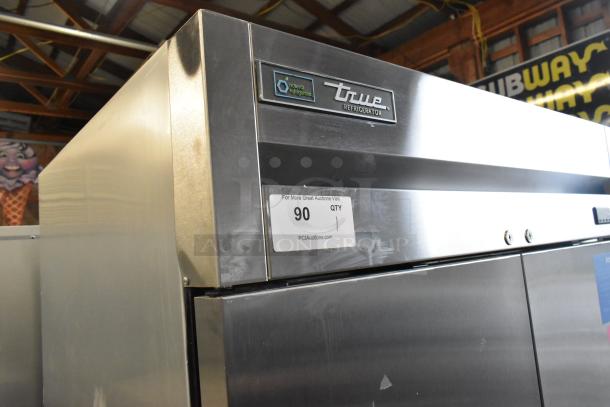 2021 True T-35-HC stainless steel 2-door reach-in cooler with poly-coated racks, 115V, excellent condition.