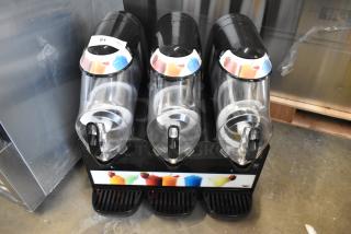 Vollrath VCBA168-37 commercial slushie machine with triple hoppers, 1.6-gallon capacity each, 115V, in excellent condition.
