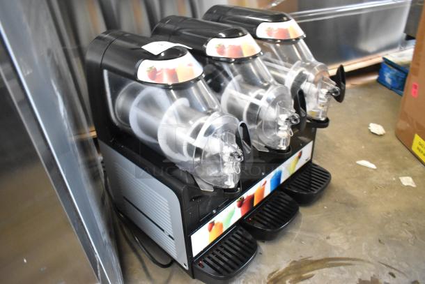 Vollrath VCBA168-37 triple hopper slushie machine, 1.6-gallon capacity each, 115V, 1 phase, excellent condition.
