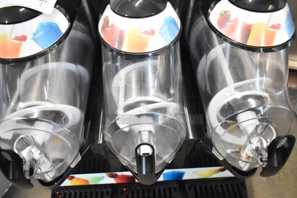 Vollrath VCBA168-37 commercial countertop slushie machine, triple hopper, 1.6 gal capacity each, 115V, excellent condition.